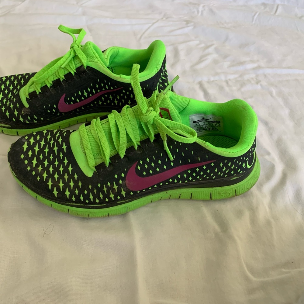 Green Nike running sneakers